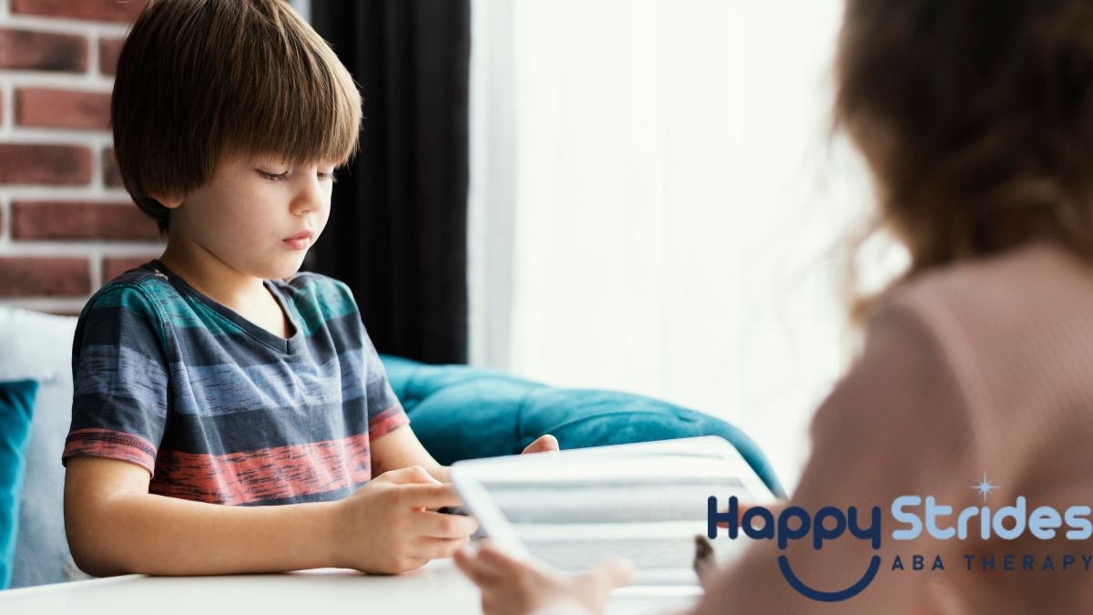 A young boy with autism works on an executive functioning assessment while being guided by his therapist.